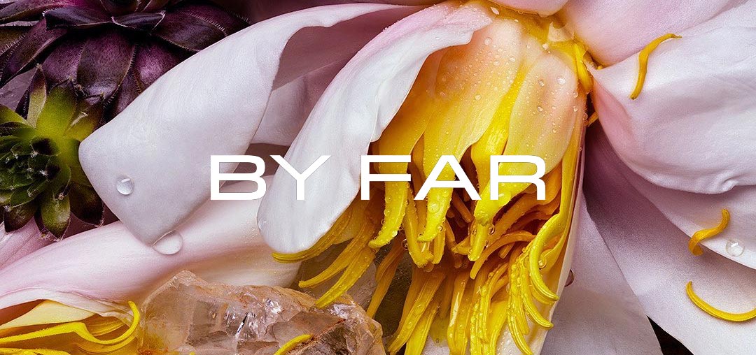 Close up photo of a pink flower with the By Far logo superimposed in white.