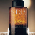Photo of the Body Exfoliator with a tan background.