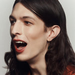 Photo of model wearing the Cream Highlight Stick - Perla.