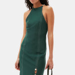 Close half body photo of model wearing the Drapey Maxi Dress - Trekking Green.
