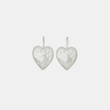 Flat detail photo of the Heart Burn Earrings - White Bronze.