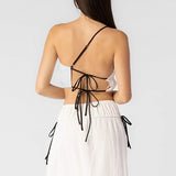 Back half body photo of model wearing the Off Shoulder Cotton Gauze Top - White.