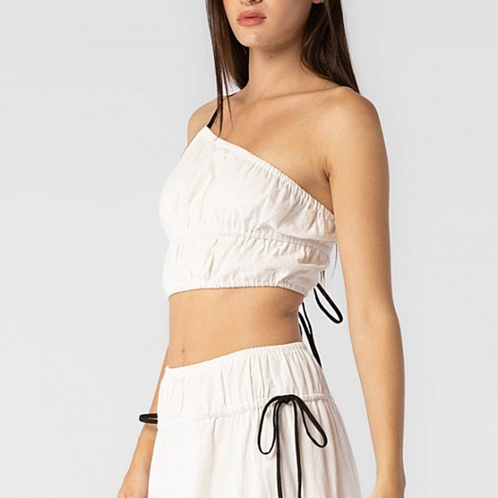 Close side body photo of model wearing the Off Shoulder Cotton Gauze Top - White.