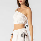 Close side body photo of model wearing the Off Shoulder Cotton Gauze Top - White.