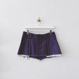 Flat hanging photo of the Pleated Low Rise Mini Skirt - Navy.