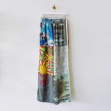 Silk pajama style pants created from multiple vintage scarves and overdyed in a seafoam green tonal color - back of the size Small.