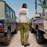 Back full body photo of model wearing the Ripstop Cargo Beach Pant - Lizard.