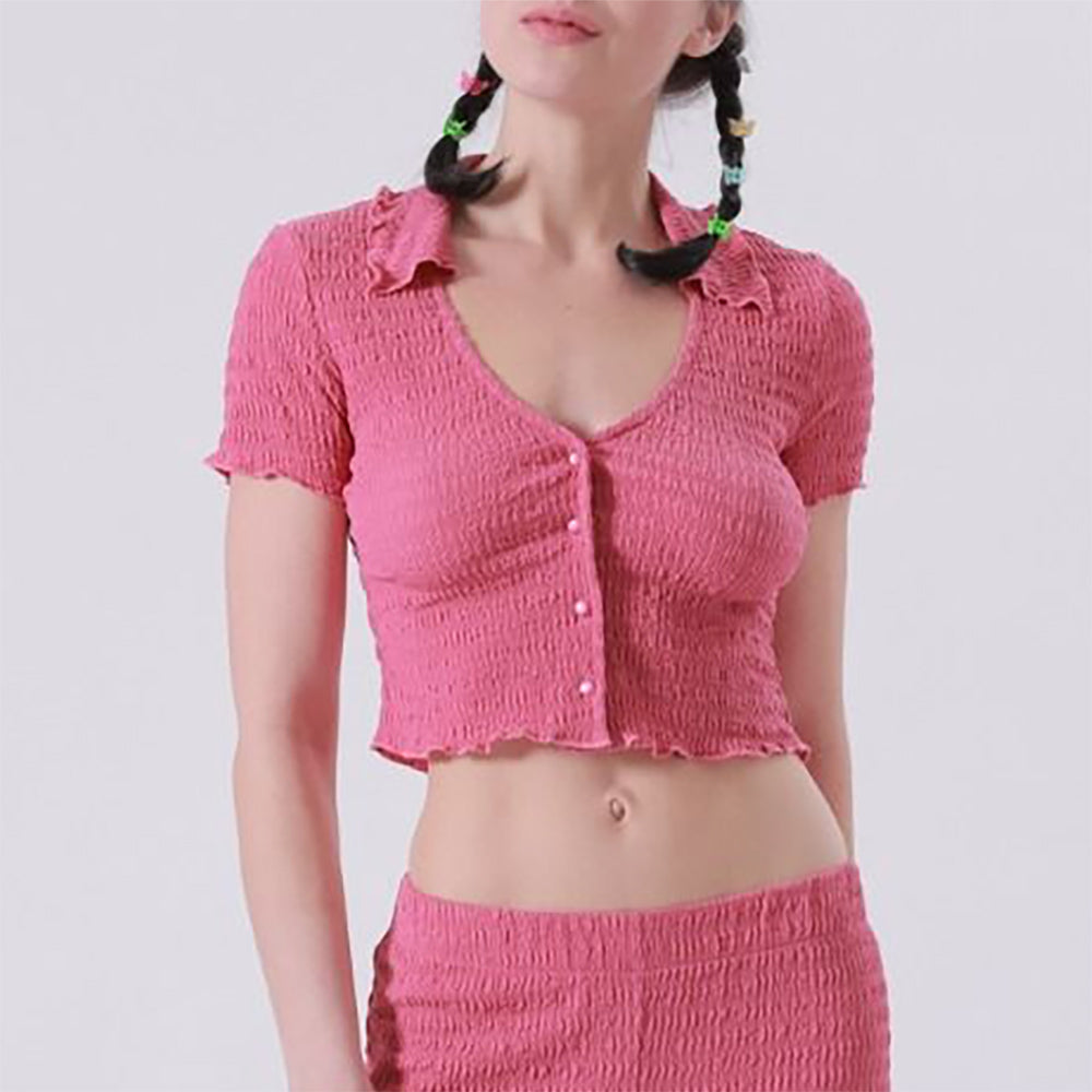 Close half body photo of model wearing the V-Neck Ruched Polo Top - Dark Rose.