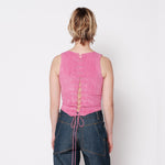 Back half body photo of model wearing the Cord Bustier - Pitaya.