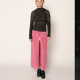 Front full body photo of model wearing the Cord Zip Skirt - Pitaya.