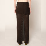 Back half body photo of model wearing the Eclipse Skirt - Stone.