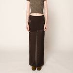 Close half body photo of model wearing the Eclipse Skirt - Stone.