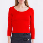 Close half body photo of model wearing the Maria Scoop Neck - Blood Orange.