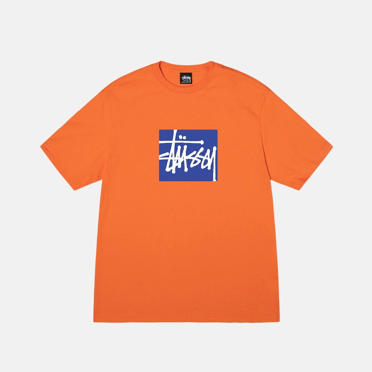Flat photo of the Stock Box Tee - Coral.