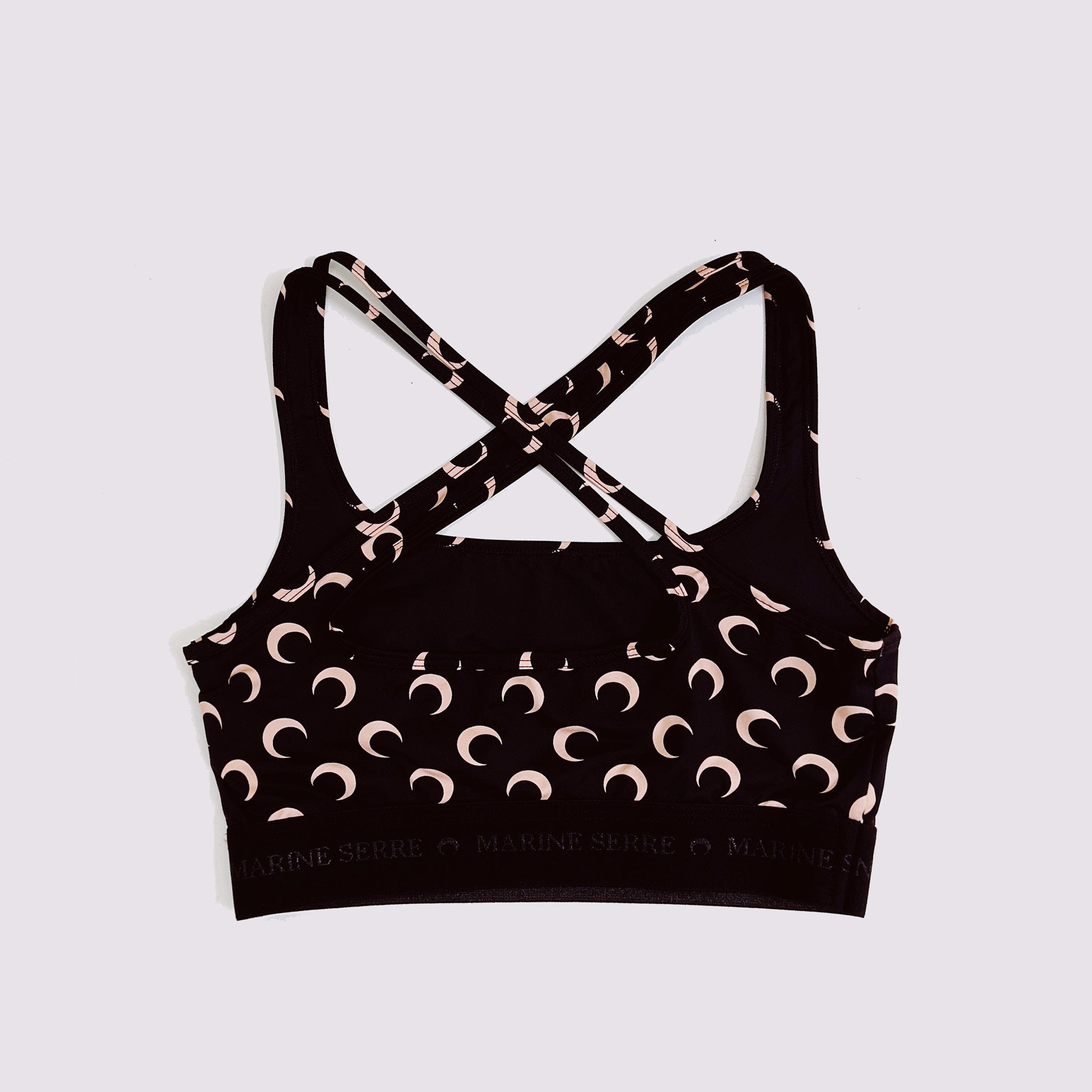 Marine Serre black all-over-moon printed sports bra with asymmetrical straps - back view.