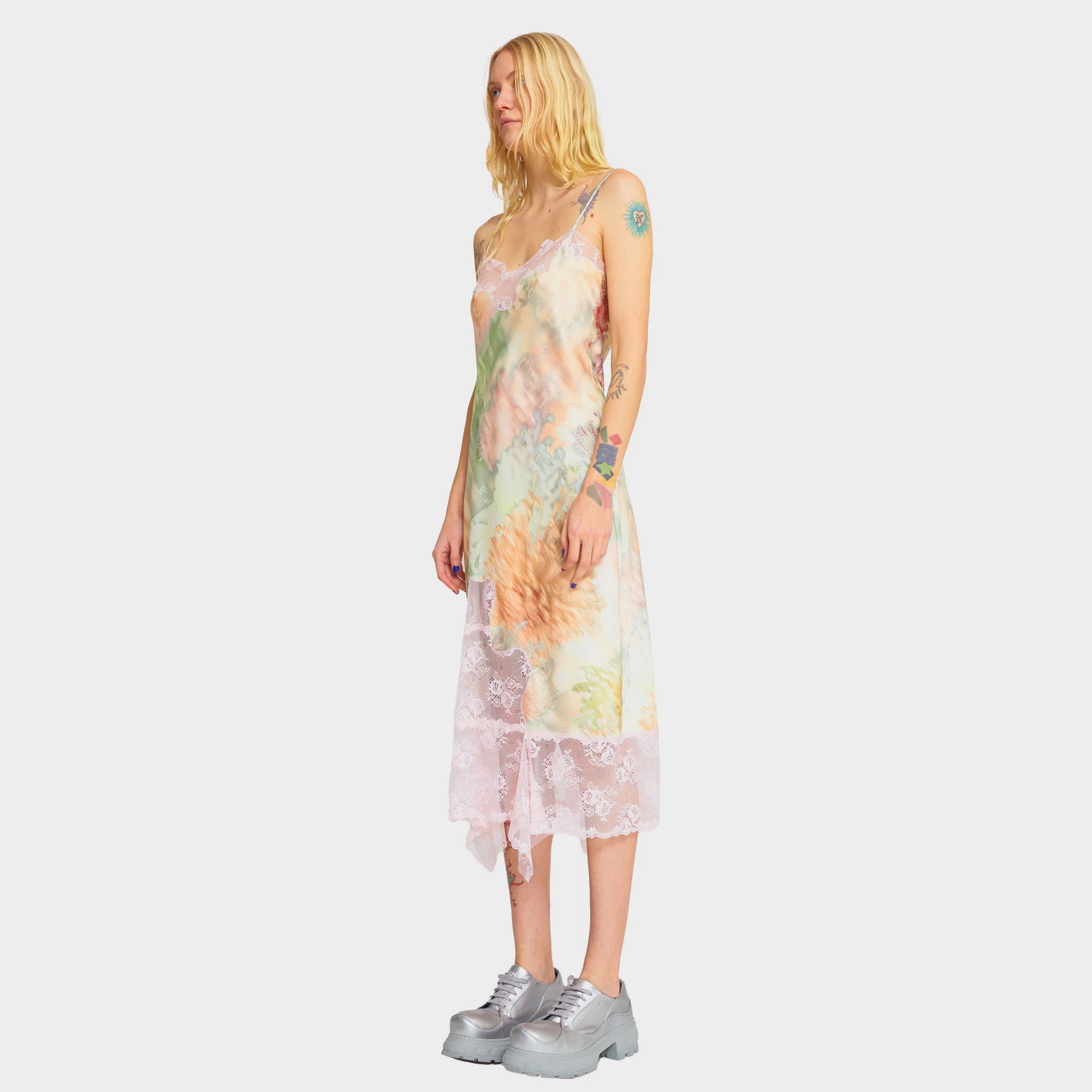 Side body photo of model wearing the Ammi Dress - Light Chrysanthemum.