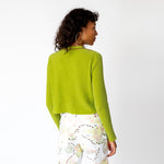 Back view of the ribbed lime green Angle Cardigan by Eckhaus Latta.