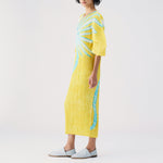 Side full body photo of model wearing the Puff Sleeve Dress - Ice Desert.