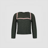 Flat photo of the Auto Sweater. The sweater features a large collar with a pink lace trim.