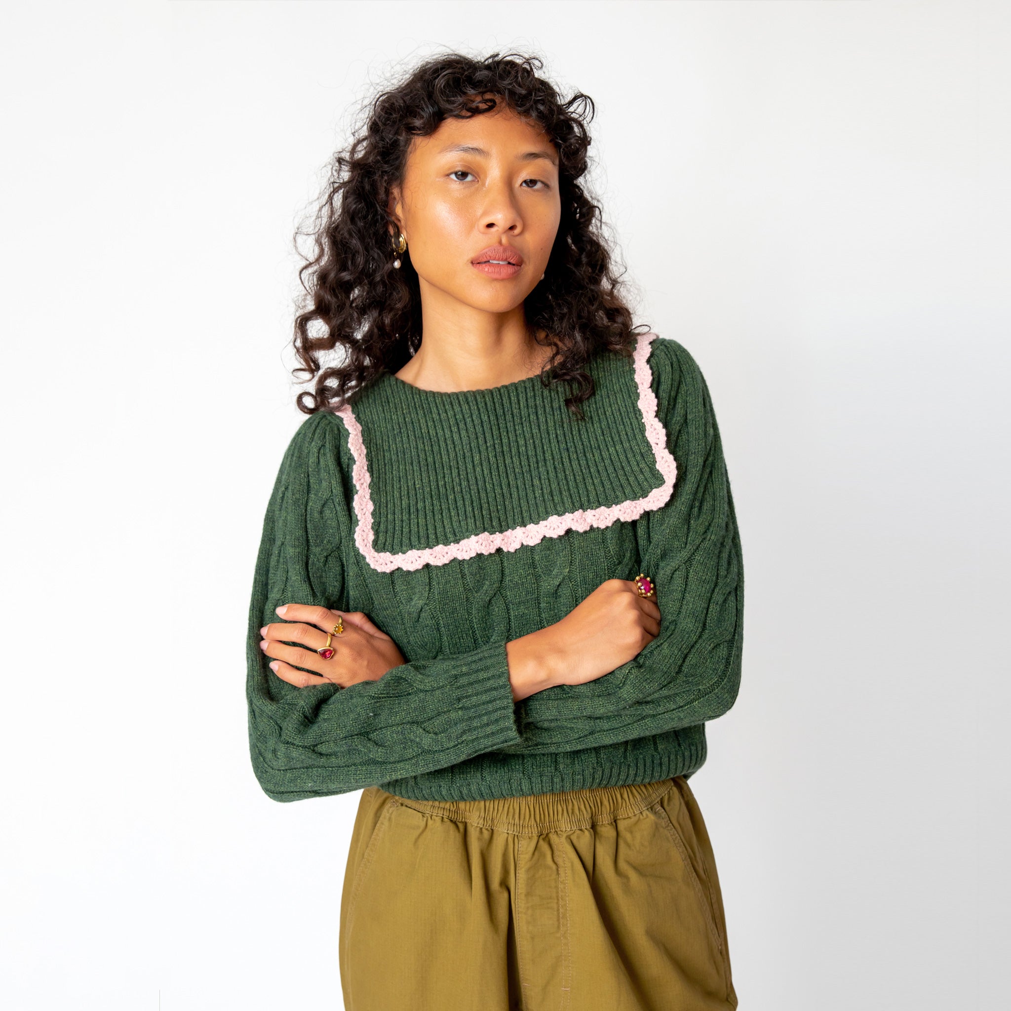 Front half body photo of model wearing the Auto Sweater.