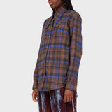 Close half body photo of model wearing the bunny button up - brown plaid.