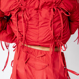 Close detial photo of model wearing the Cam Pants.