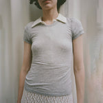 Front half body photo of model wearing the Campos Tee - Smoke.