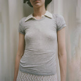 Front half body photo of model wearing the Campos Tee - Smoke.