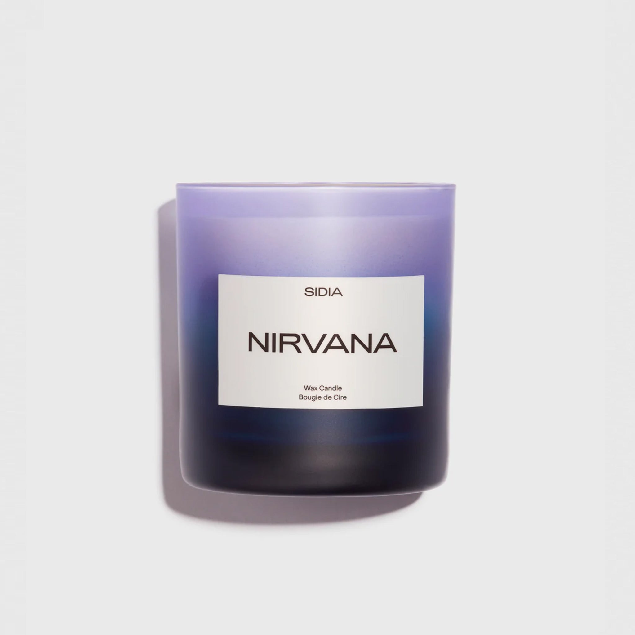 The frosted purple glass encircling SIDIA's Nirvana candle.