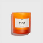 The frosted orange glass container for SIDIA's Pyro candle.
