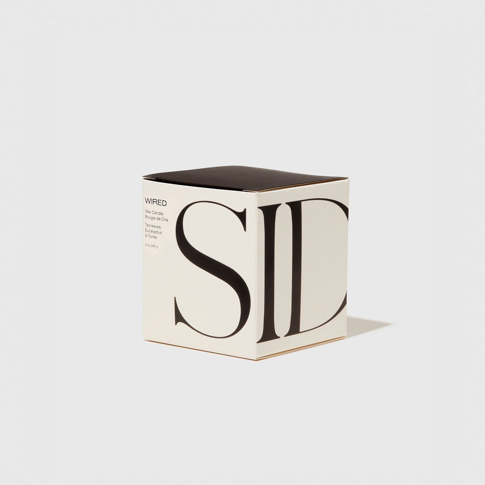 Flat photo of the Candle - Wired in the box on a white background. 