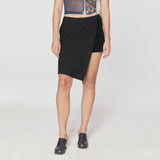 Front half body photo of model wearing the Club Skort - Cynar.