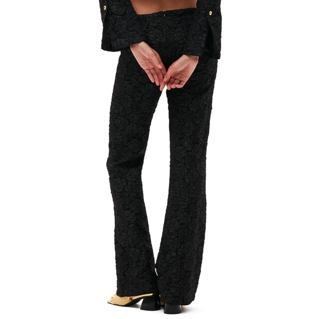 Back half body photo of Stretch Jacquard Flared Pants - Black.
