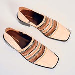 Wales Bonner - Heritage Loafer in ivory calfskin with multicolored woven detailing the vamp - top down view.