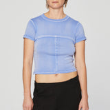 Front half body photo of model wearing the Lapped Baby Tee - Periwinkle.