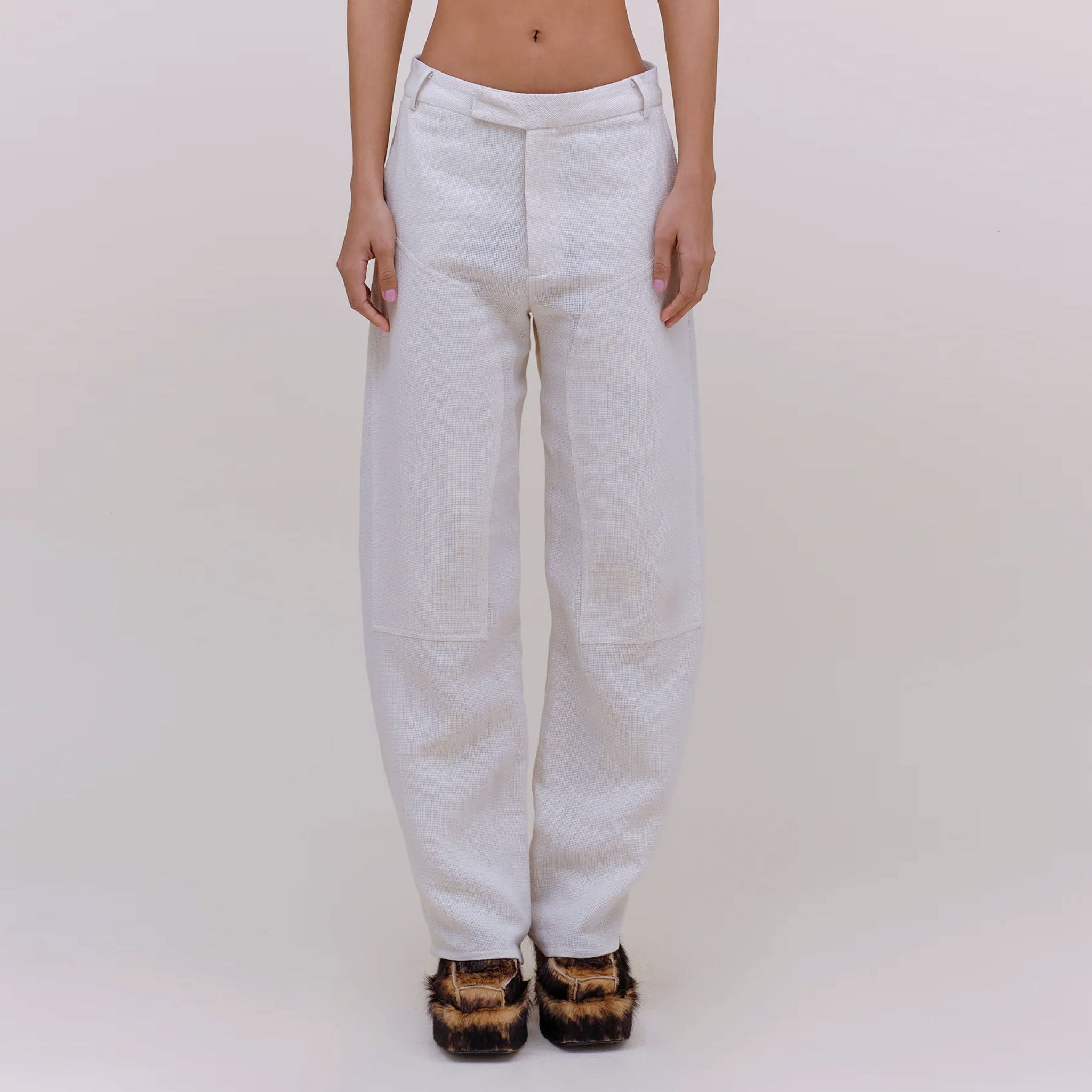 Front half body photo of the Linen Pant - Natural.