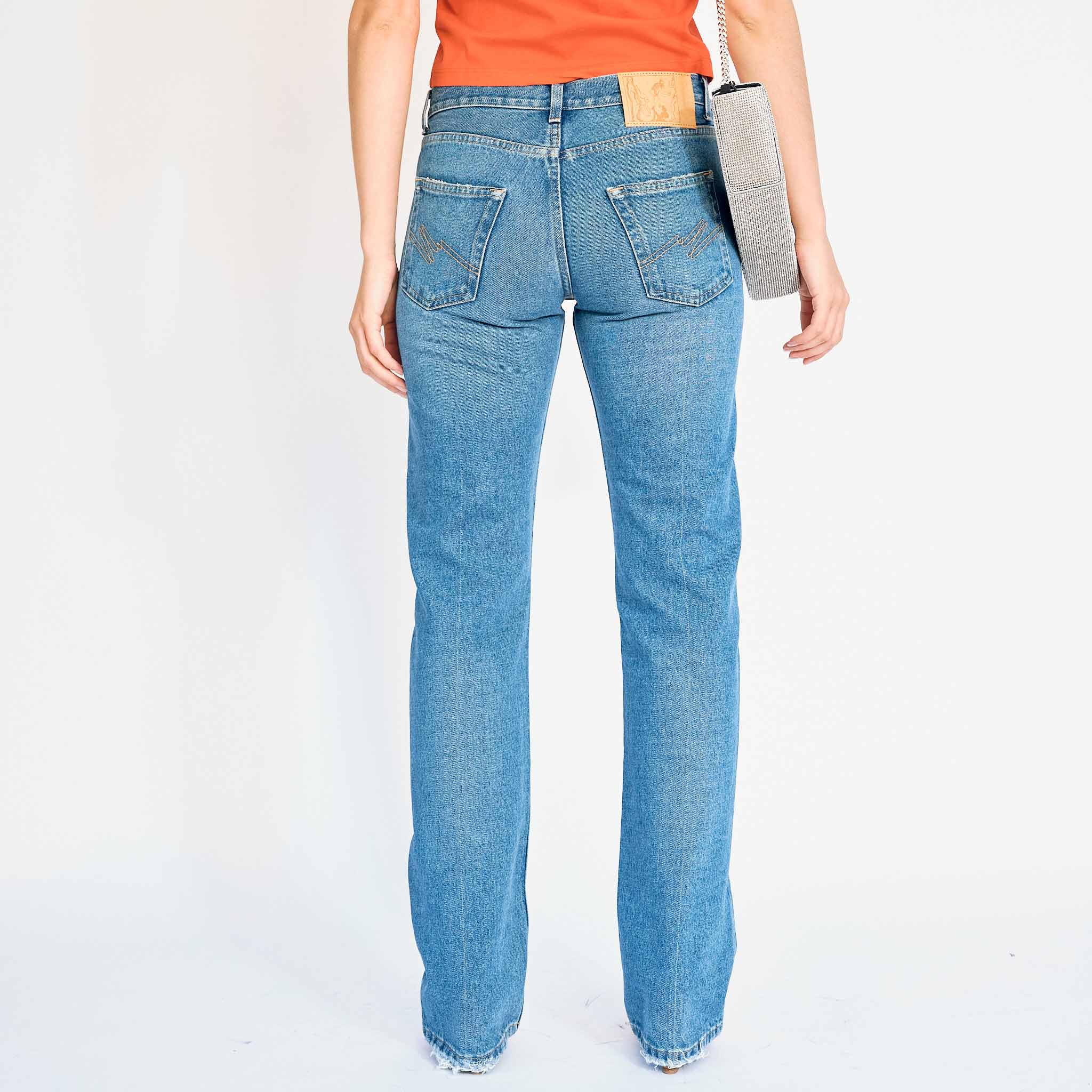 Martine Rose classic womens low rise jeans on a model - back view.