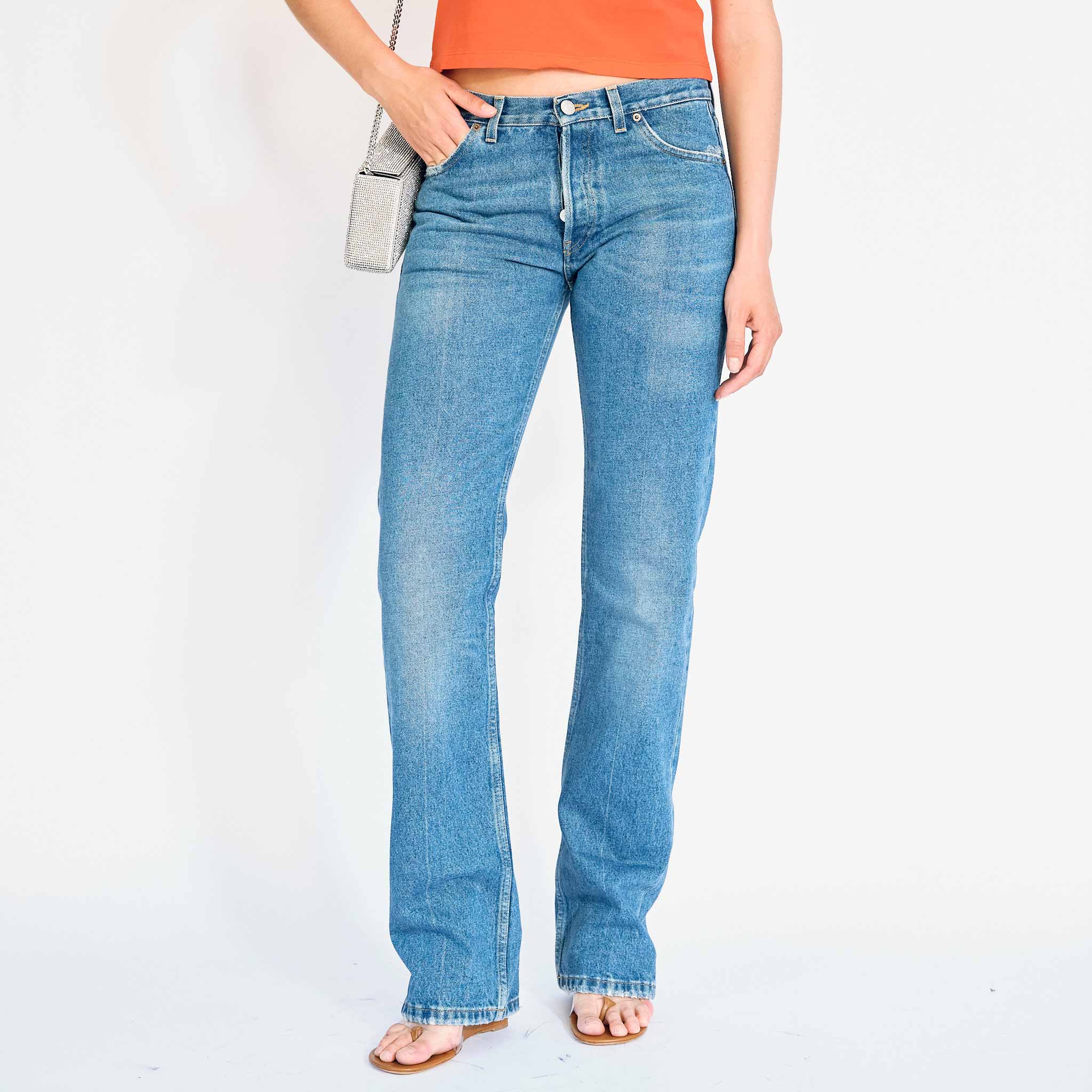 Martine Rose classic womens low rise jeans on a model - detail view.