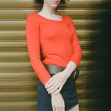 Side body photo of model wearing the Maria Scoop Neck - Blood Orange.
