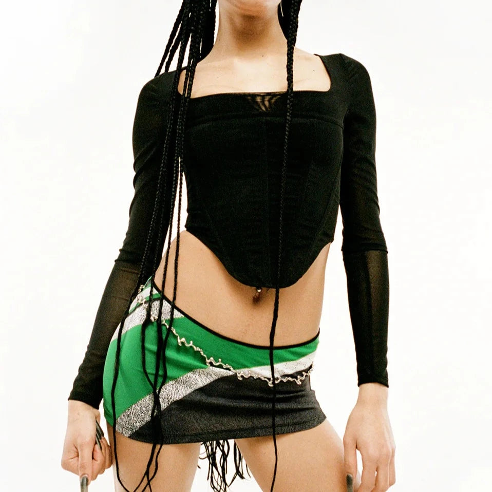 Half body photo of model wearing the Maude Corset - Black.