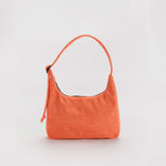 Small nylon shoulder bag in a cheerful bright orange colorway with black zipper and adjustable shoulder strap.
