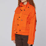 Side detail photo of model wearing the Mobile Jacket - Flame .