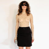 Half body photo of model wearing the Monogram Flocked Mesh Turtleneck - White/Beige