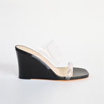 The iconic Olympia Wedge from Maryam Nassir Zadeh in black leather and clear perspex toe strap and vamp - side view.
