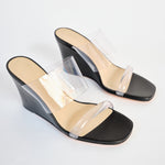 The iconic Olympia Wedge from Maryam Nassir Zadeh in black leather and clear perspex toe strap and vamp - top angled view.