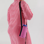 Back photo of model wearing the Puffy Water Bottle Sling - Extra Pink