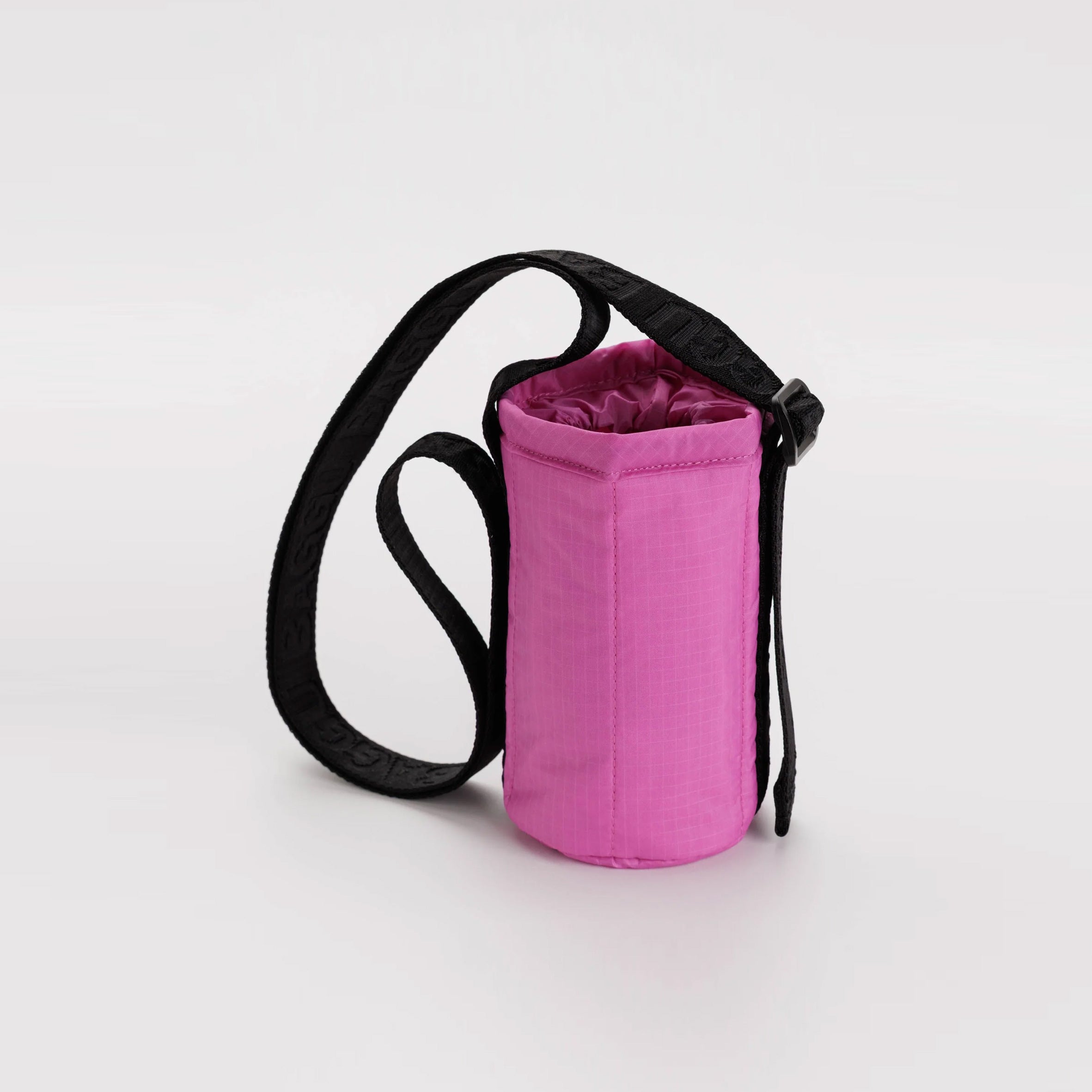 Close flat photo of the Puffy Water Bottle Sling - Extra Pink.