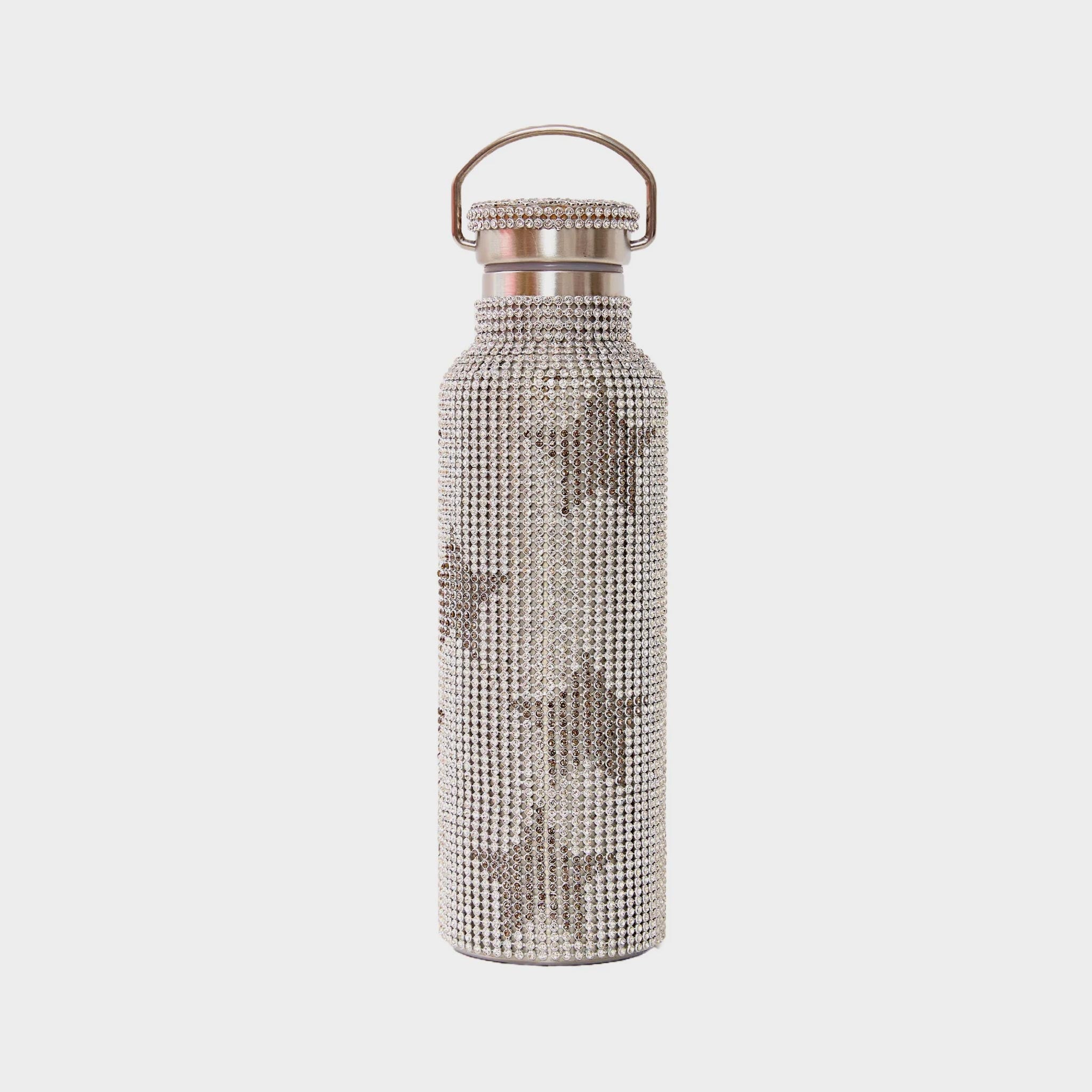Stainless steel water bottle covered in rhinestones laid out in a pattern to show black stars on white crystals.
