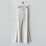 Flat photo of the Ribbed Knit Flared Pants - Ivory.