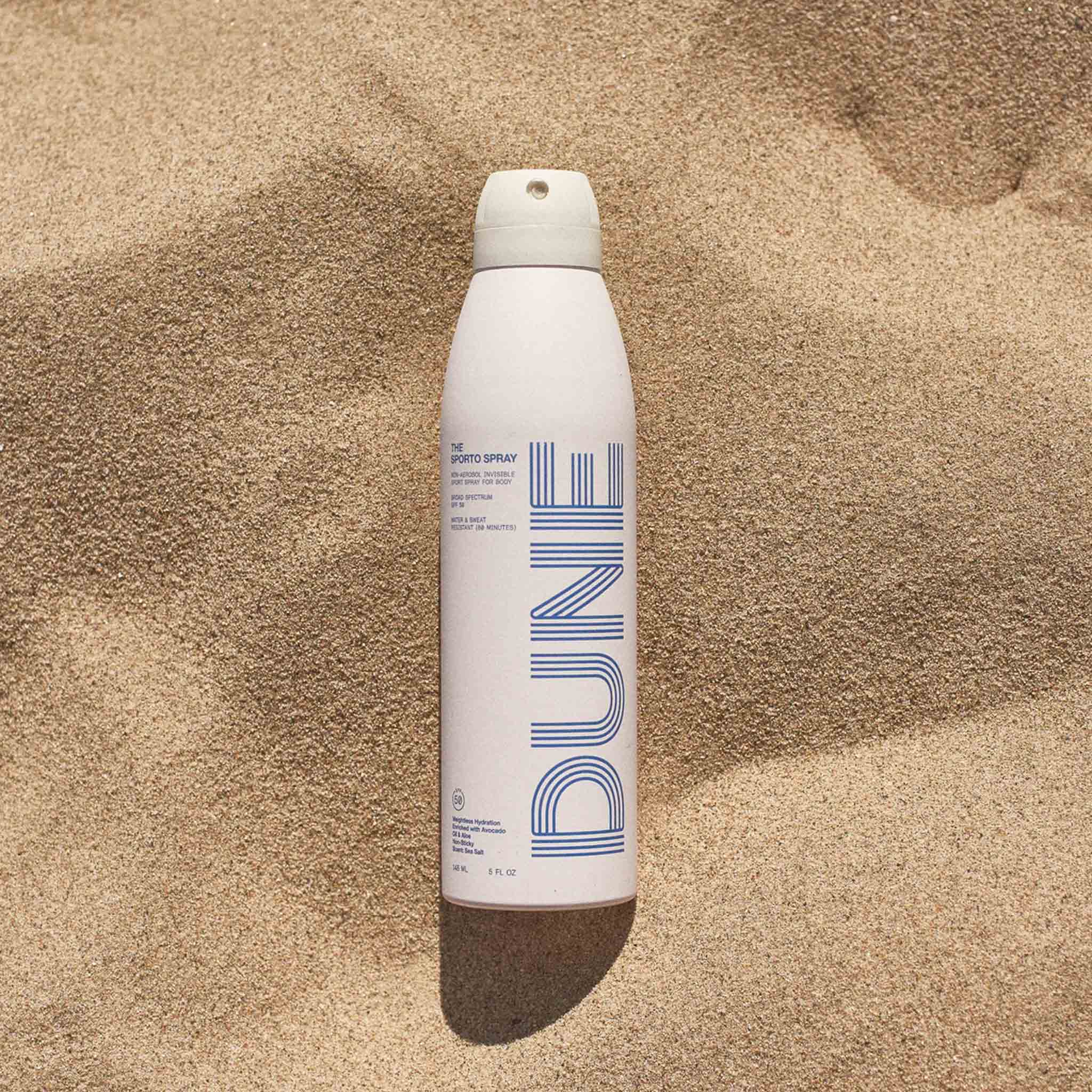 Flat photo of the The Sporto Spray in the sand.